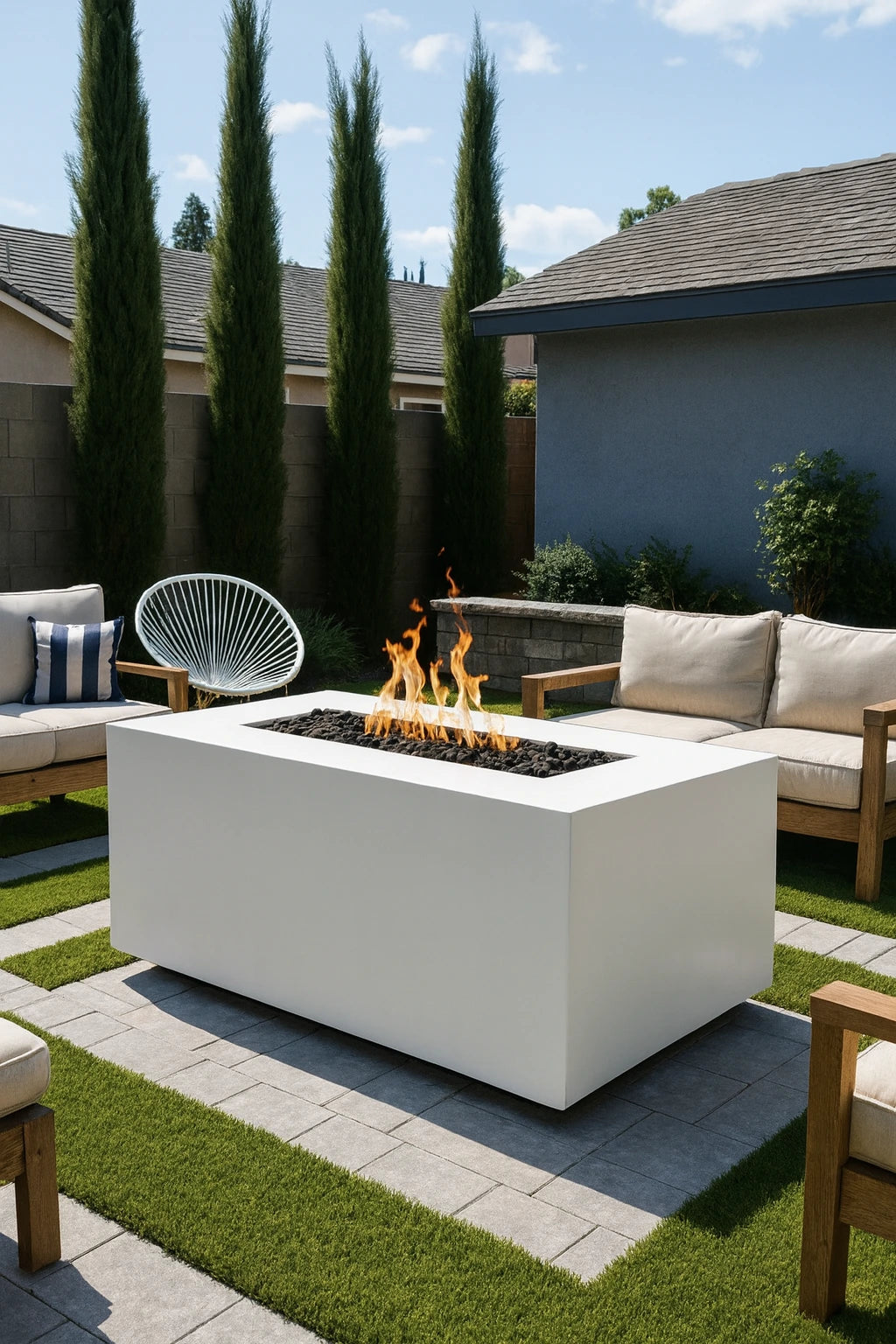 A modern backyard with a 60" Pismo Gas Fire Pit.