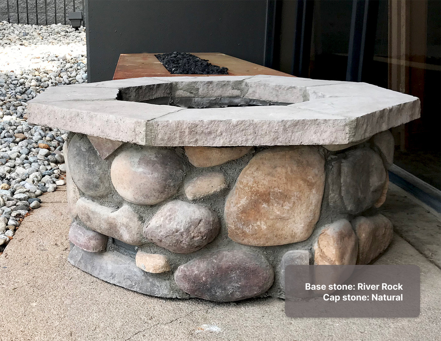 Custom stone fire pit with "River Rock" base & "Natural" cap stones