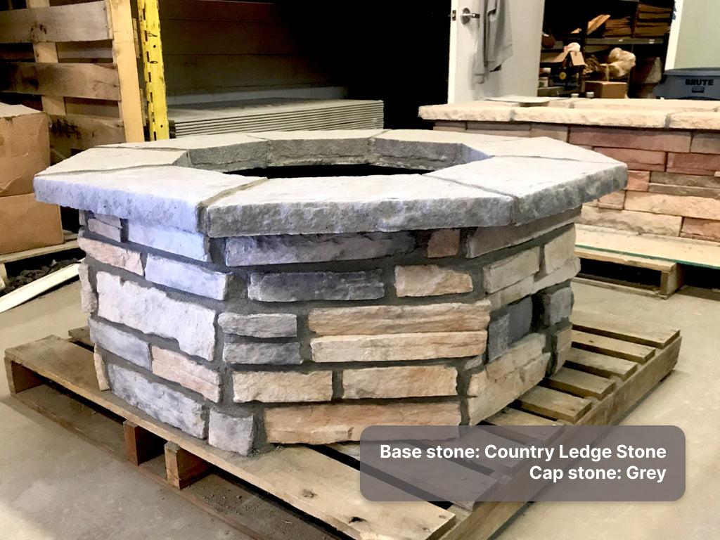 Custom stone fire pit with "Country Ledge" base & "grey" cap stones