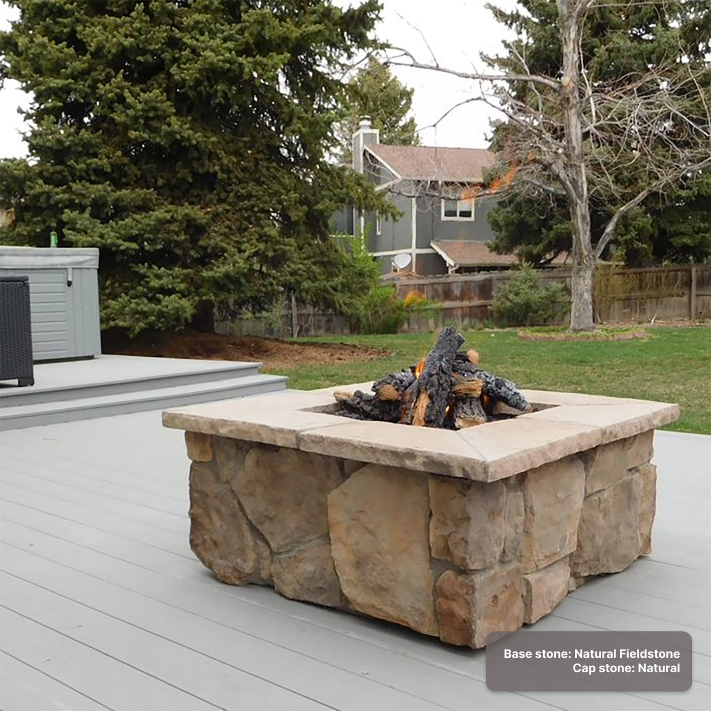 Custom stone gas fire pit with "Natural Fieldstone" base & "Natural" cap stones