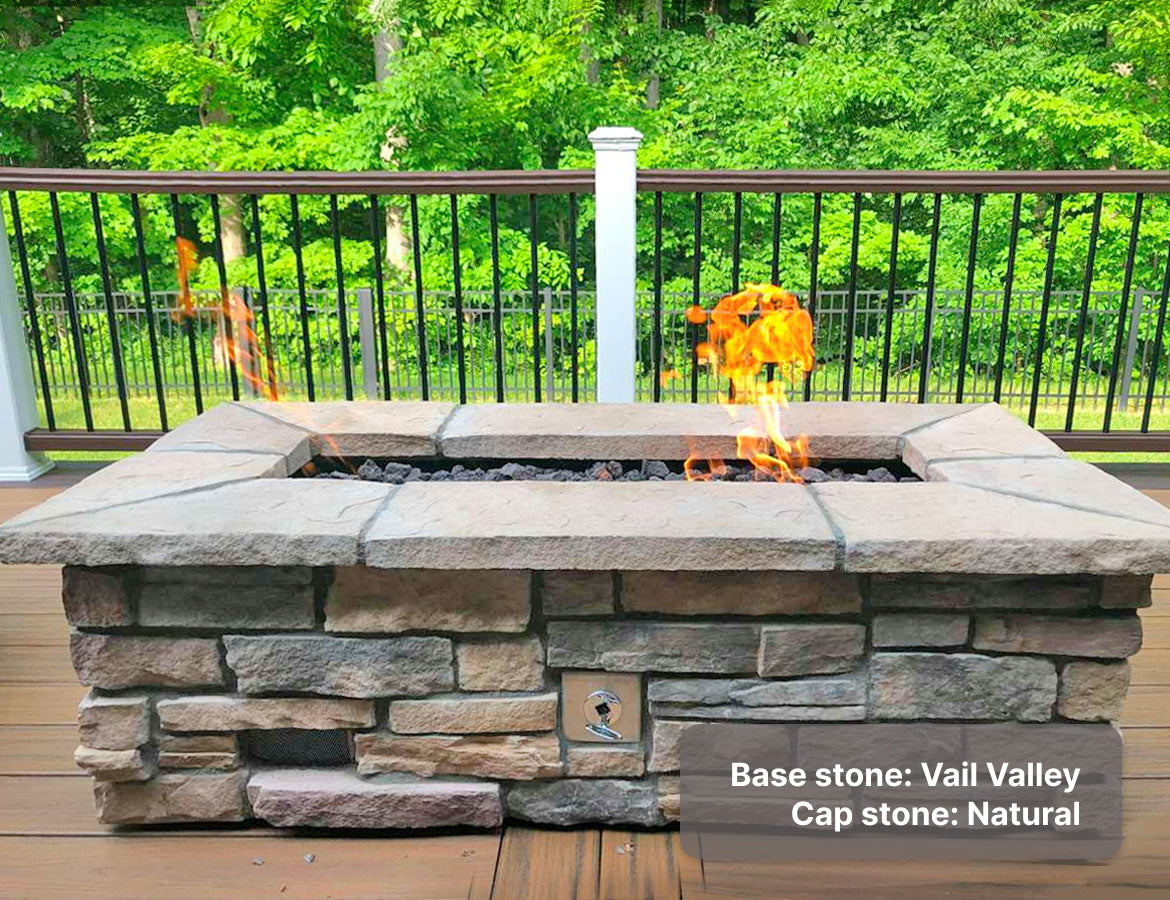 Custom stone fire pit with "Vail Valley" ledge base and "Natural" cap stones