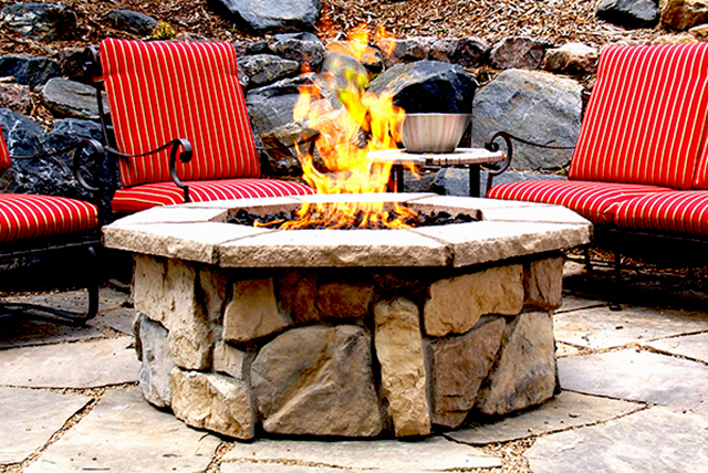 An outdoor gas fire pit built with Custom Octagon Fire Pit Kit 37″.