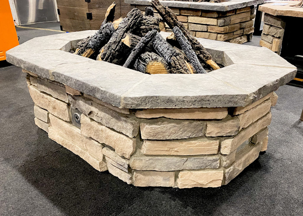 A fire pit built with Custom Rectagon Fire Pit Kit 52″ x 33″.